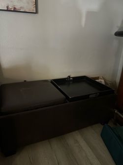 black storage ottoman