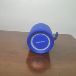 Brookstone AquaBeat Waterproof Bluetooth Speaker IPX6 LED Lights. Used in good condition with some cosmetic blemishes. These blemishes are in the form
