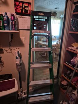 6 Feet fiberglass ladder garage kept