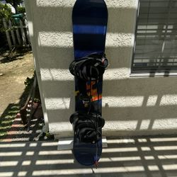 Snowboard With Bindings And Boots