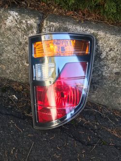 Used 2006 Honda Ridgeline rear lamp.