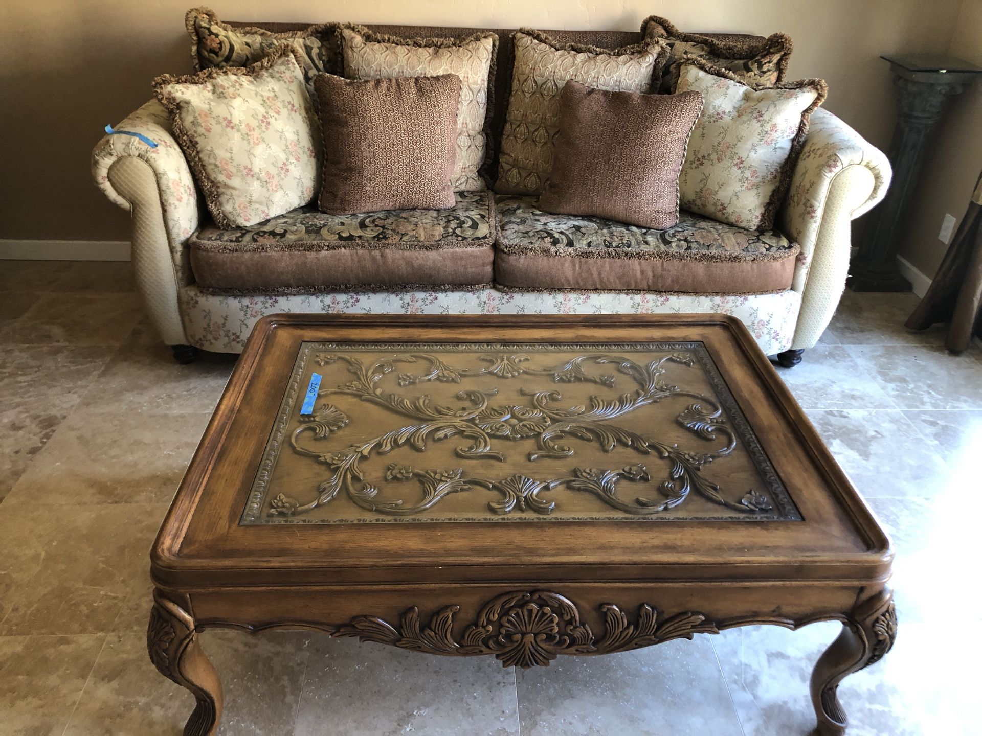 Coffee table and end table , beautiful carved wood and glass top