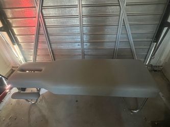 Massage table