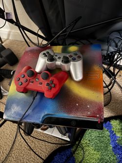 PS3 with 2 controllers and 15 games for sale