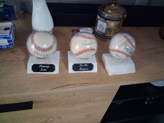 Tommy John & Rollie Fingers Signed Baseballs with Stands