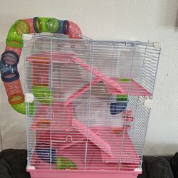 Pink hamster cage