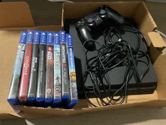 Sony PS4 Slim console with games
