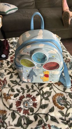 Winnie the Pooh in eager backpack used $20