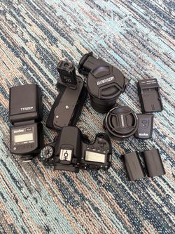 Canon eos70D, Flash godoxTT520, Lens 50mm &85 mm, battery grip canon