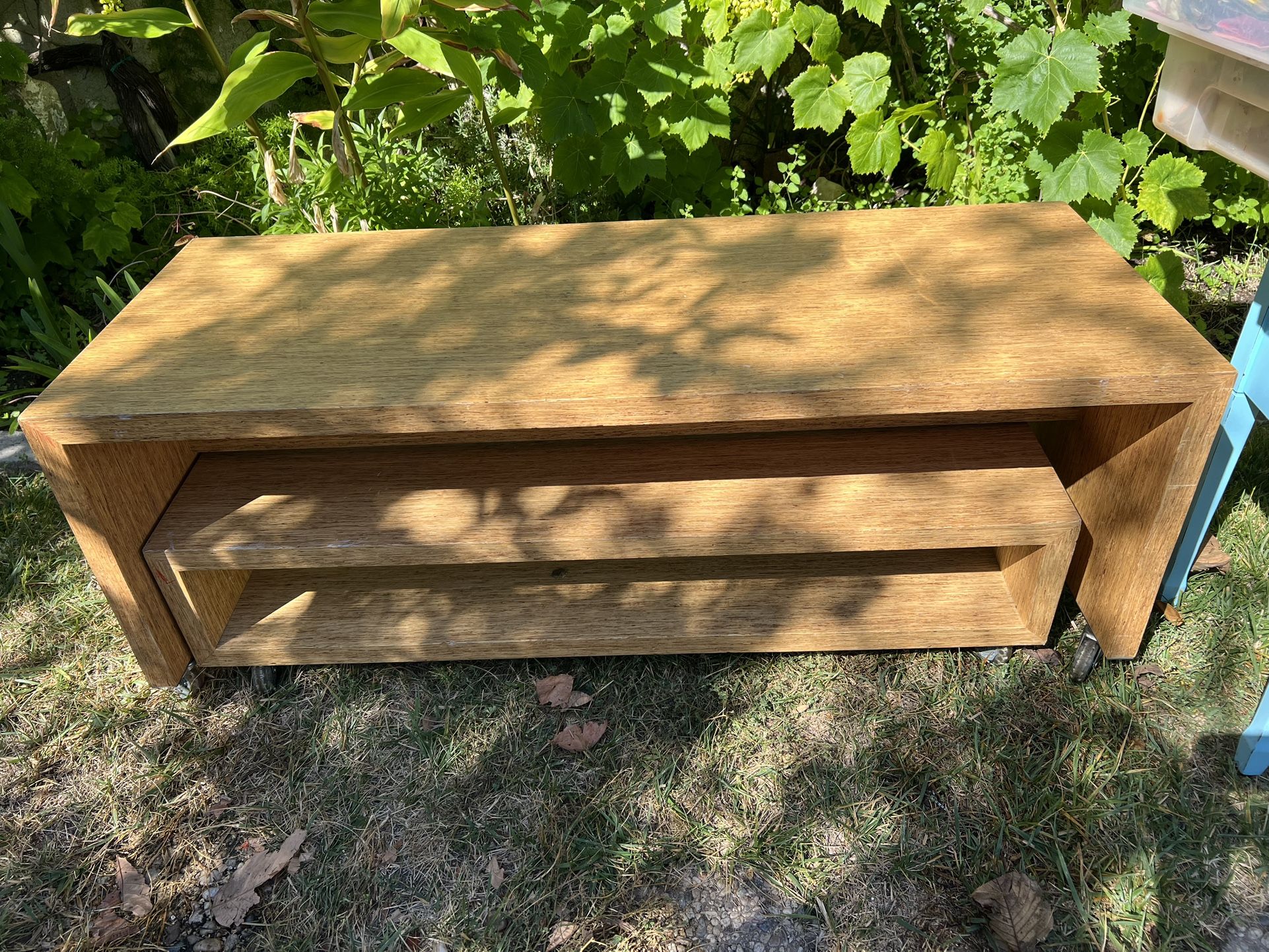 Unique two piece console table / entertainment center w/ skateboard wheels!