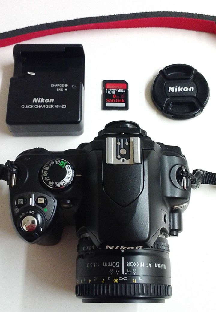 Nikon D40 + 50mm Nikon Lens (DSLR Camera)
