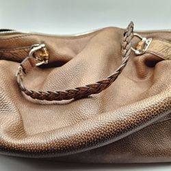 Gucci Magnificent Bamboo Bar maxi shopping bag in cognac-colored grained leather. Braided leather handles and Guccissima leather inserts