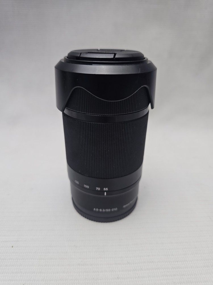 Sony 55-210mm f4.5-6.3 OSS zoom lens (Black) w/Lens caps, Lens hood 