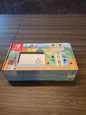 Photo Brand New Nintendo Switch - Animal Crossing: New Horizons Edition - Switch