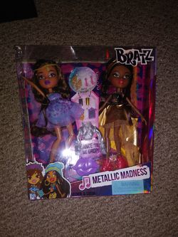 Two Bratz dolls with metallic outfits, new