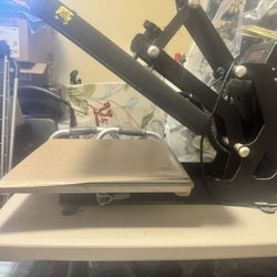 550$ T-Shirt Printing Press Attached To Table 