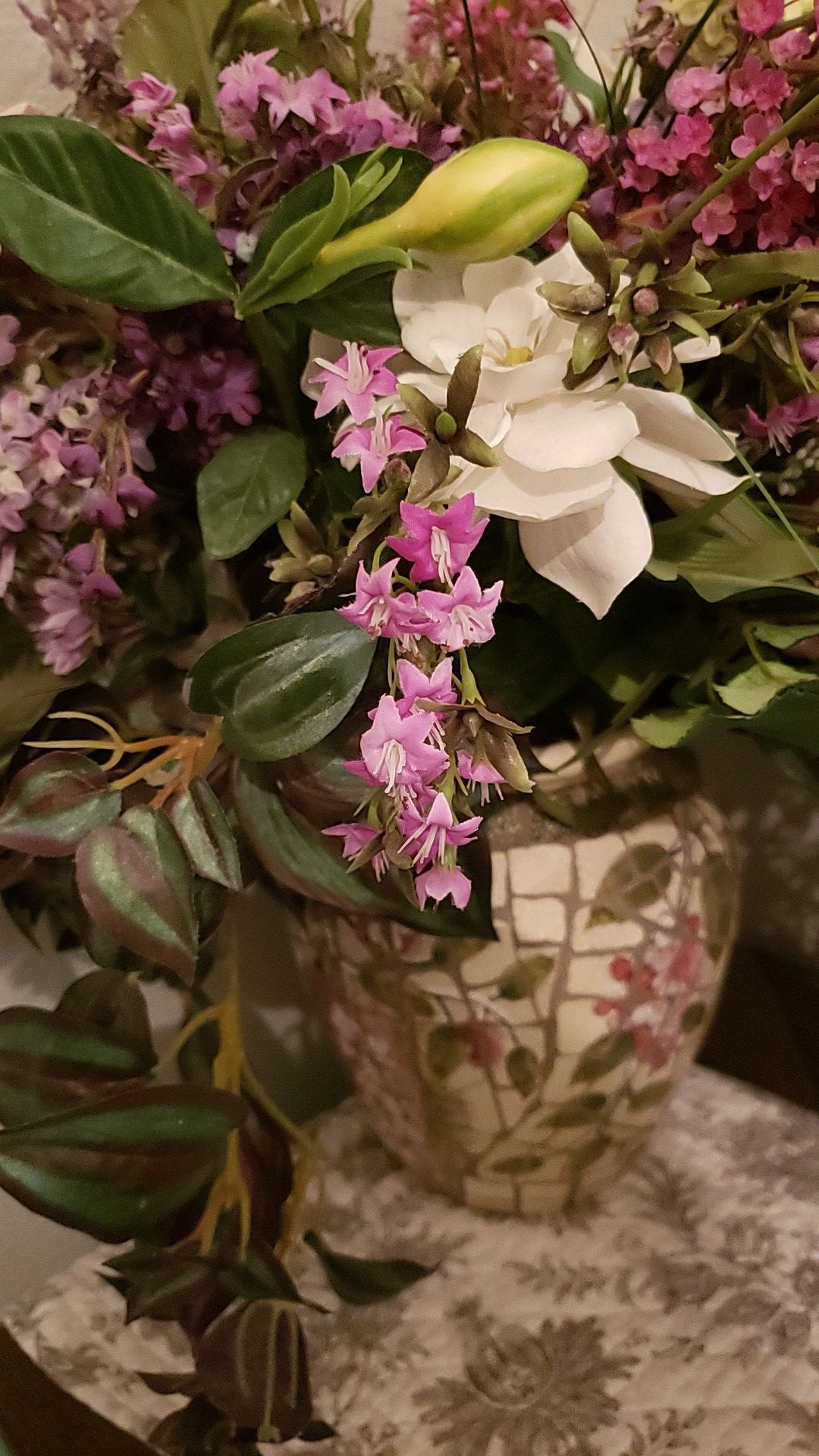 Silk flowers in vase.