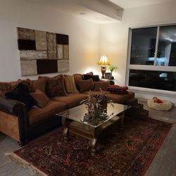 Free Sparkling Clean Sectional Sofa In Good Condition With Wear On The Arms