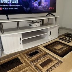 white wooden TV stand 