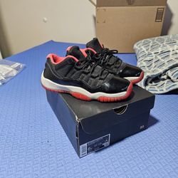 Red And Black Jordan 11s size 6