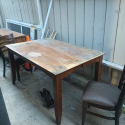 Solid Wood Table With Pop Up Leaf And Two Chairs