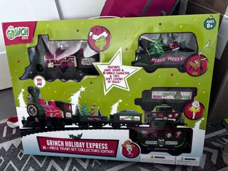 The Grinch Holiday Express 36 Piece Train Set Collectors Edition.
