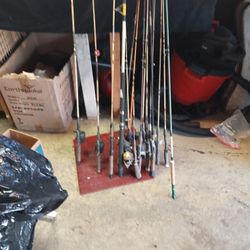 Fifteen Fishing Poles Some With Reels Used 