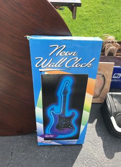 NEO wall clock new in box