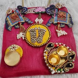 Diwali Gift Potli Bags,Haldi Kumkum Tilak Plate,Tea Light And Lakshmi Charan 