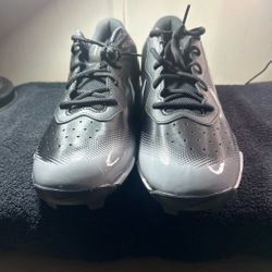 Nike vapors black an white football cleats