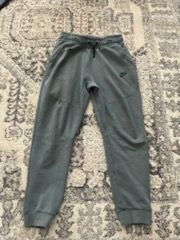 Dark blue Nike tech pants