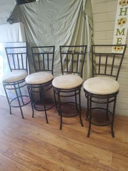 4 countertop chairs , price is for All 4