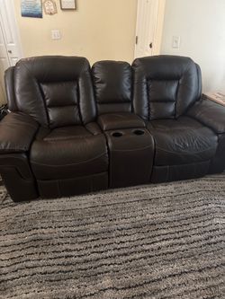 Brown leather sectional couch