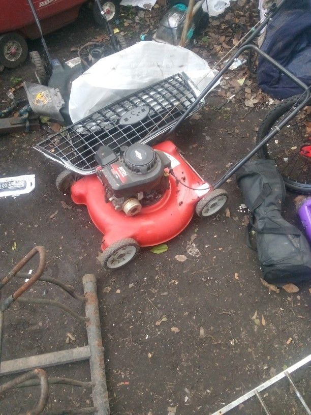 Running Lawn Mower