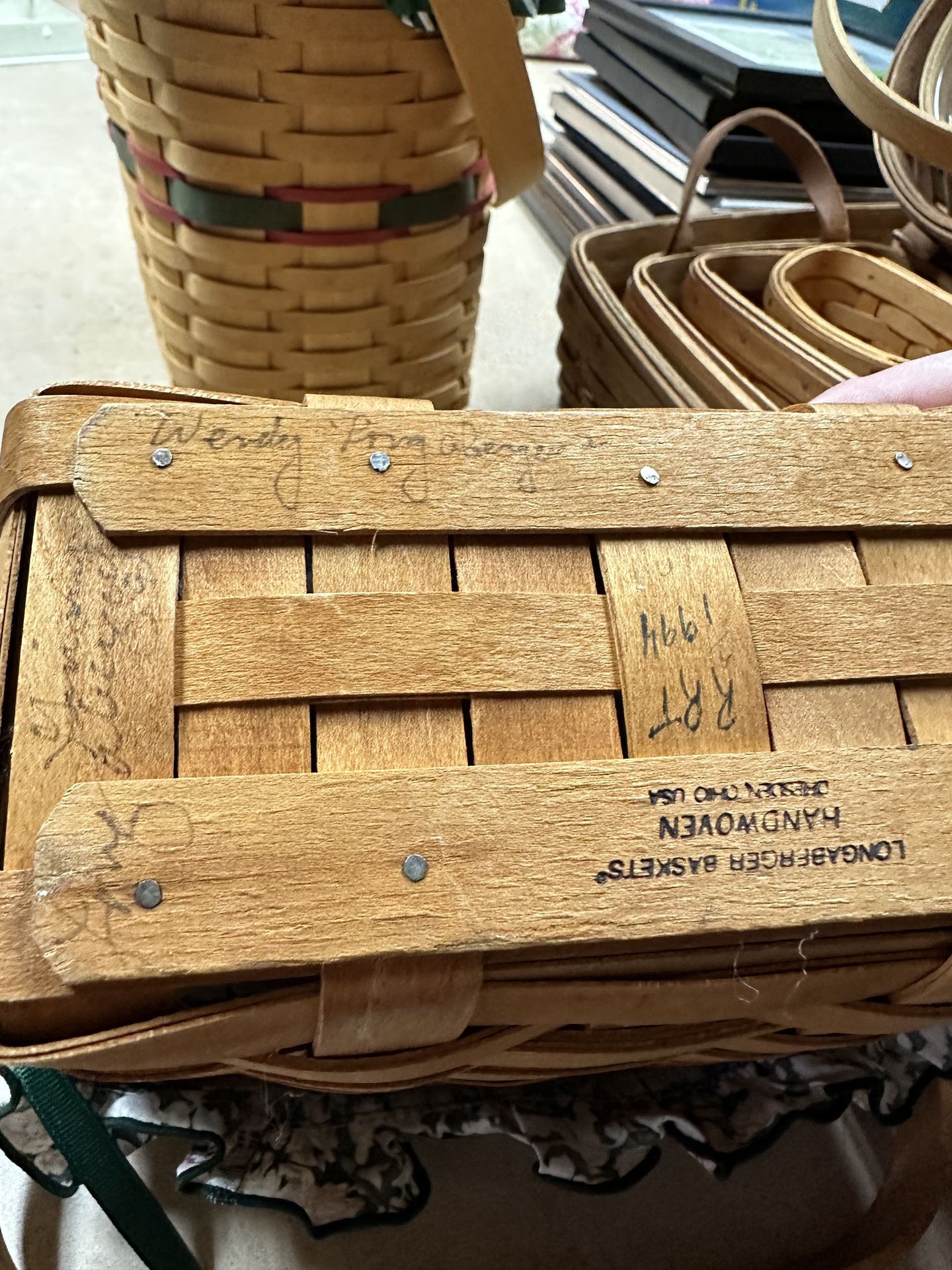 Lot of 14 Longaberger baskets one signed by 3 family members