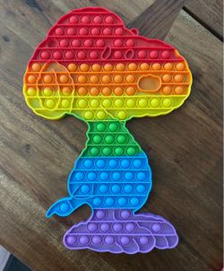 JUMBO giant-sized rainbow-colored Snoopy-shaped Pop It fidget toy