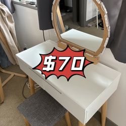 vanity with mirror and light