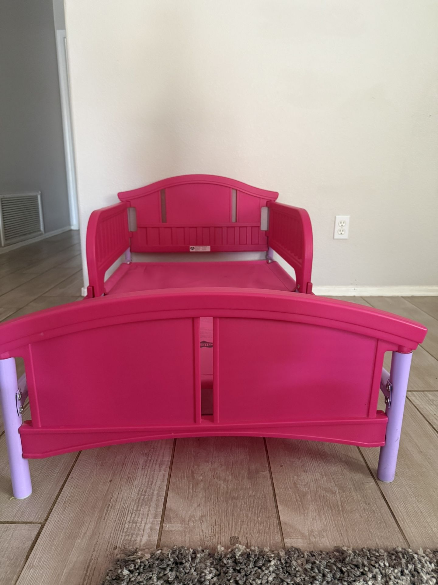 Toddler Bed – Pink Plastic Frame with Side Rails