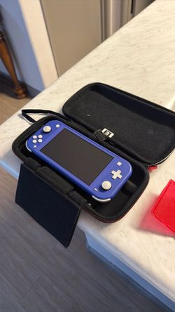 Blue Nintendo Switch Lite Bundle – 4 Games & Charger