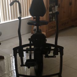 Exercise bike with foot petals and arms that move for the perfect workout