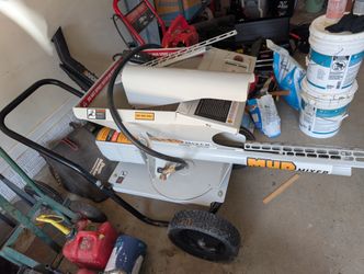 THE MUD MIXER CONCRETE MACHINE