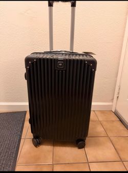 Brand new check in luggage for sale