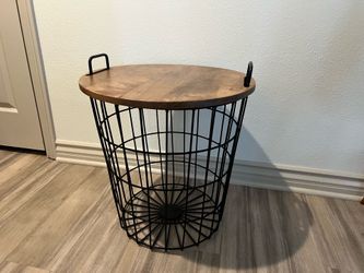 End table with blanket storage