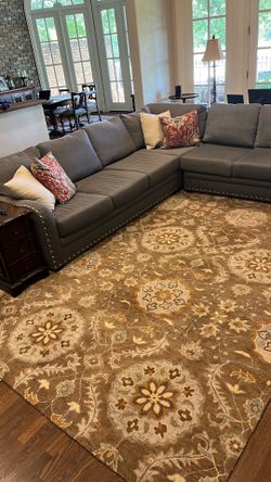 New rug for sale and 10 foot sectional