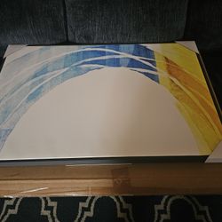 framed canvas print of a painting. 