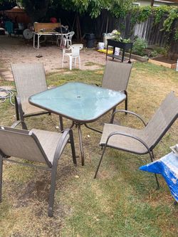Glass Patio Table and Chairs