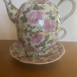 Vintage A Special Place 4-piece floral stacking tea set; Includes: teapot, lid ,cup, & saucer 