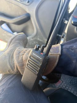 Motorola R7 (VHF- Very High Frequency) with charger.