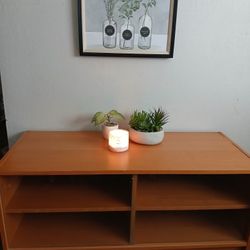 Ikea table like new my roommate moving out so she cannot take it with her send message if interested has glass doors holds up to a 55 or 50 in TV look