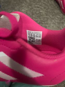 Pink soccer cleats